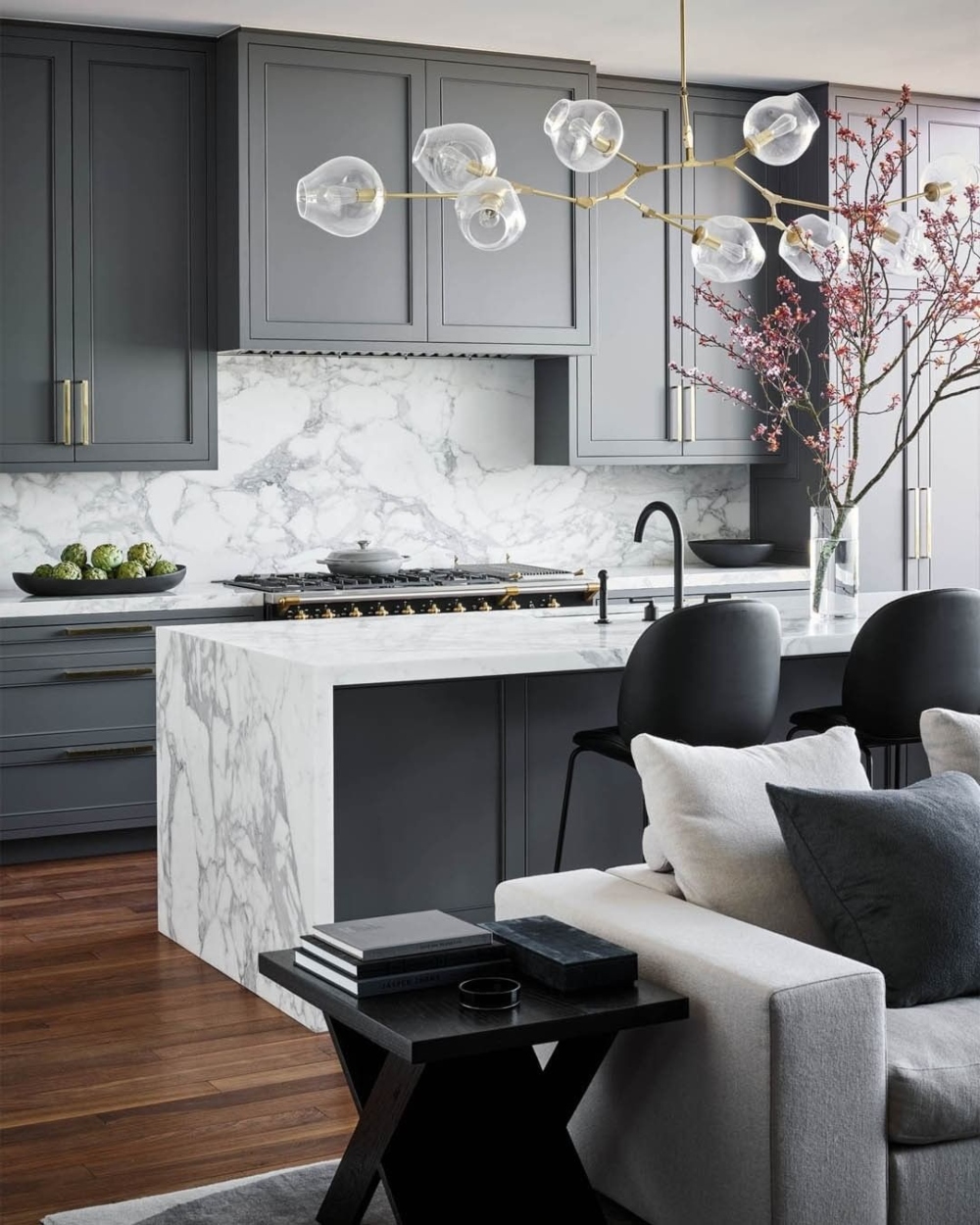 KITCHEN WITH A COMBINATION OF MARBLE AND GREY ACCENTS